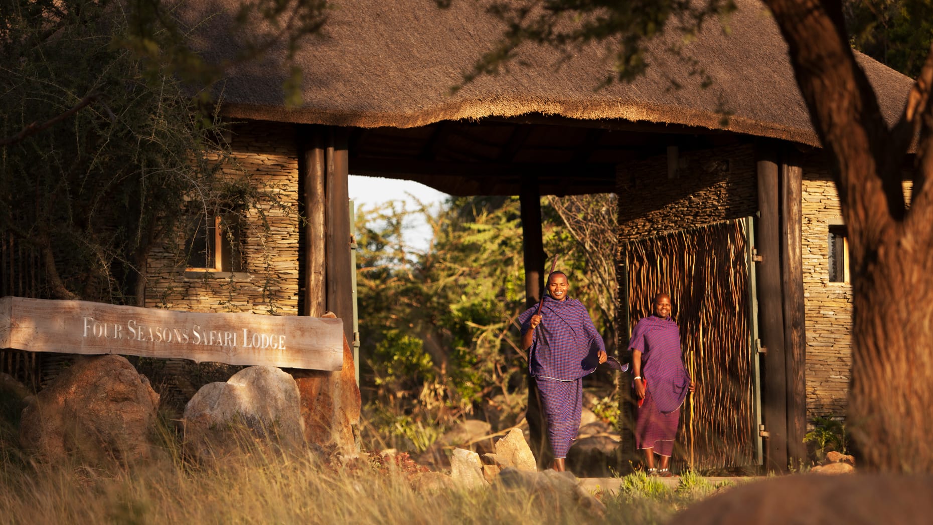 Maasai People infront of the Four seasons safari Lodge Serengeti Tanzania