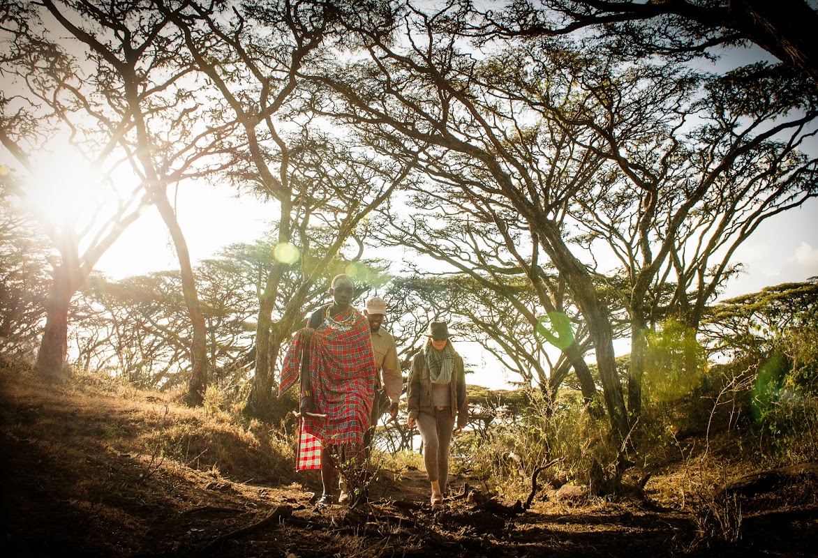 Tourists descending the Ngoronngoro Crater with a Maasai guide